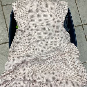 Strapless white dress with red polka dots